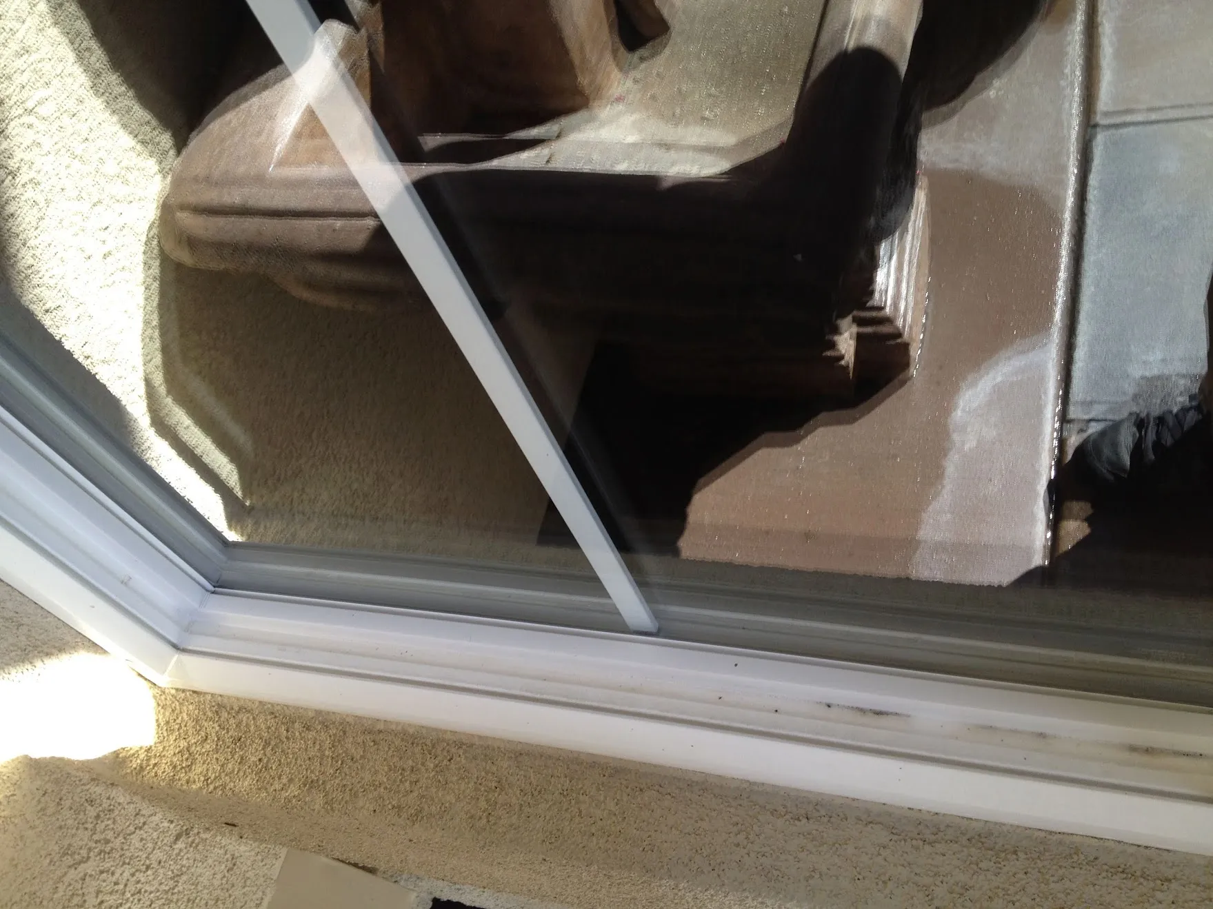 Crystal clear window after hard water mineral deposit removal by Clearvu Window Cleaning
