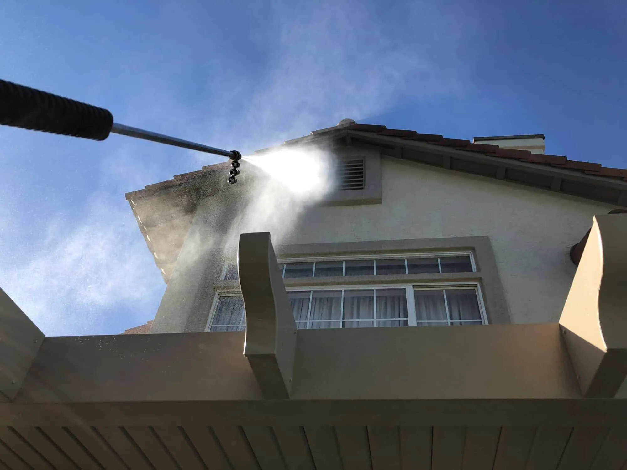 Soft washing stucco home exterior safely without damage