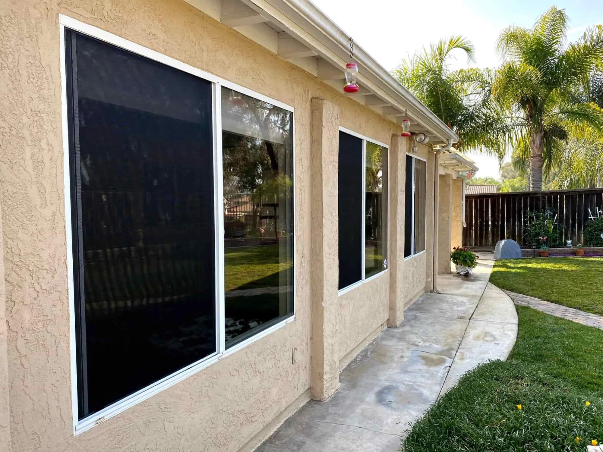 Window screen being removed from a residential window