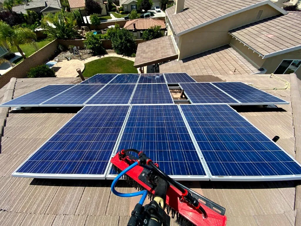 Solar panel cleaning service on a rooftop in the Temecula Valley